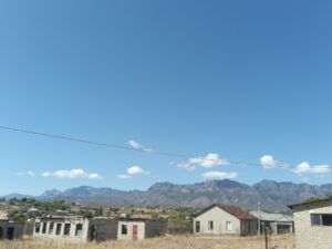 A view of small houses in South Africa on a sunny day. 